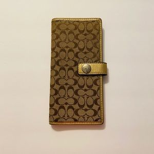 Coach gold slim wallet with inside compartments